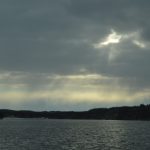 lake with cloudy skies